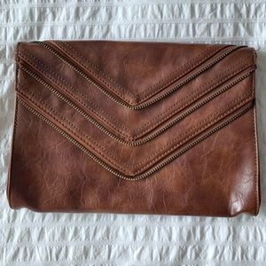 Brown leather clutch